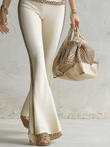 Elegant And Sporty Leopard Print Trim Off-white Knitted T-shirt And Flared Pants Set