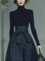 Dark blue turtleneck stretch top and plaid skirt set