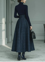 Dark blue turtleneck stretch top and plaid skirt set