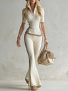 Elegant And Sporty Leopard Print Trim Off-white Knitted T-shirt And Flared Pants Set