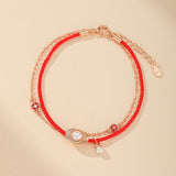 Bracelet Cordon Rouge et Perle : protection et élégance Feng Shui - Biloria