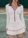 Sporty White Top With Red Zipper Details And A Matching Ruffled Skirt Set