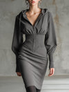 Stylish Gray Hooded Sweatshirt With Zippered Waist And Elasticated Hem Paired With A Midi Dress