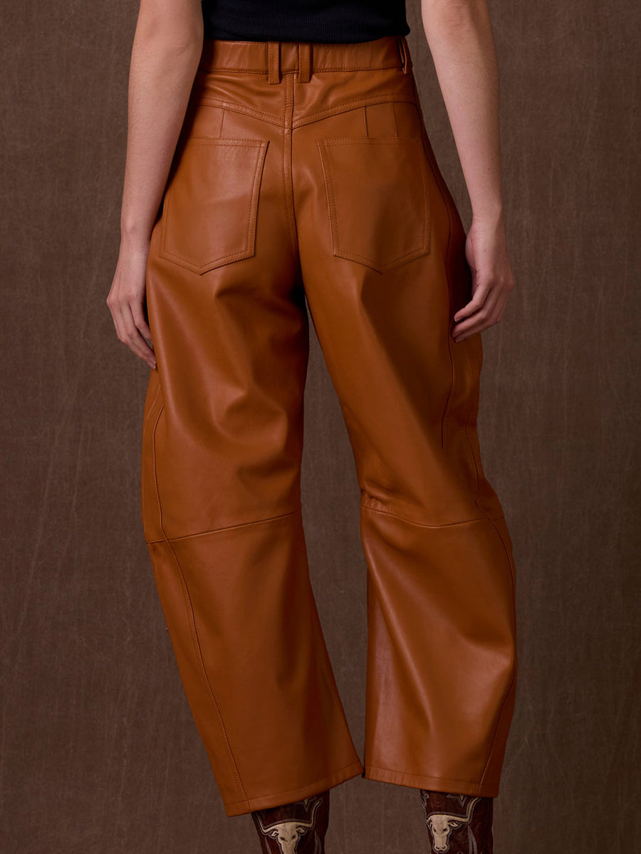 High-end Stylish Pumpkin-colored Faux Leather Curved Pants